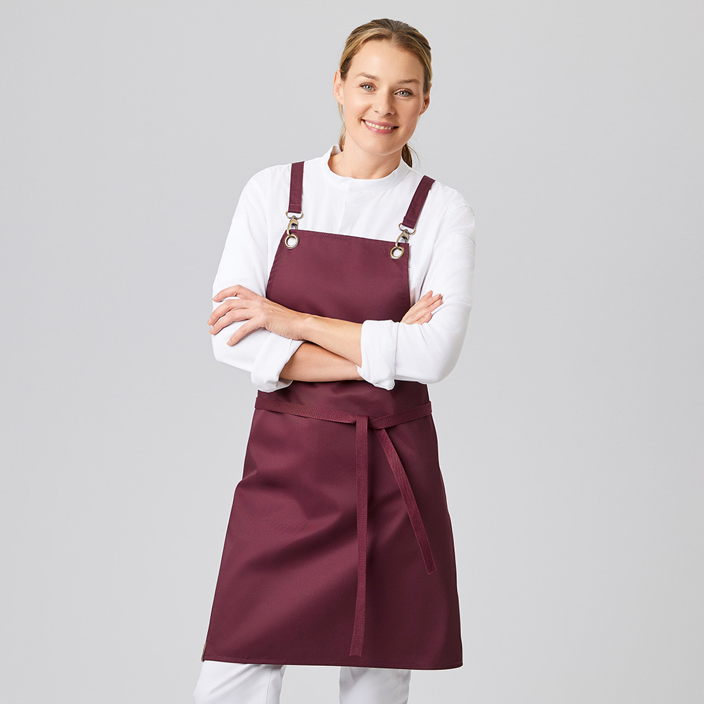Klassische Latzschürze mit austauschbaren Stoffbändern.Metall-Ösen am Latz.