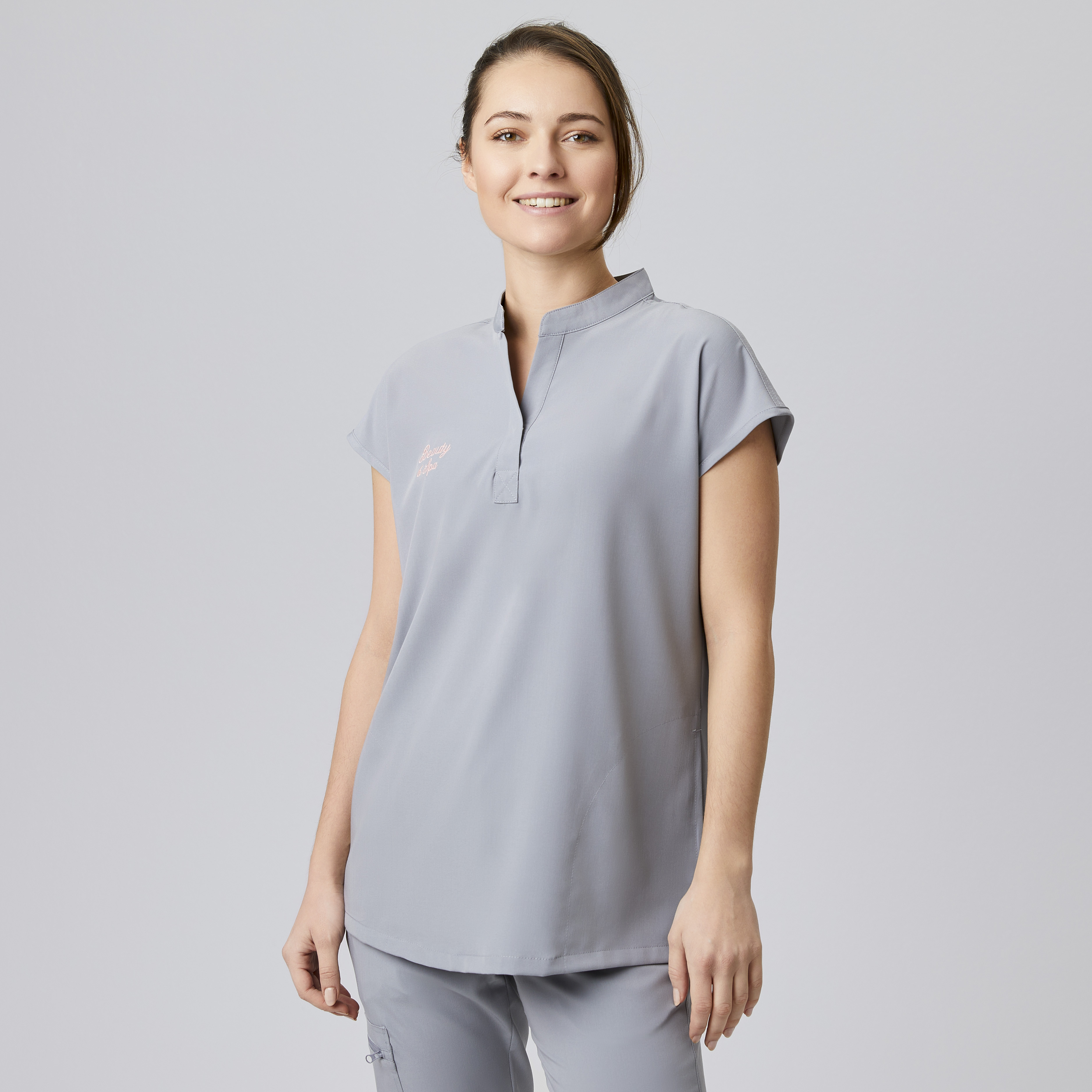 Blusen-kasack Vorderseite mit versteckter knopfleiste und Seitlichen taschen,für Kleine Utensilien.