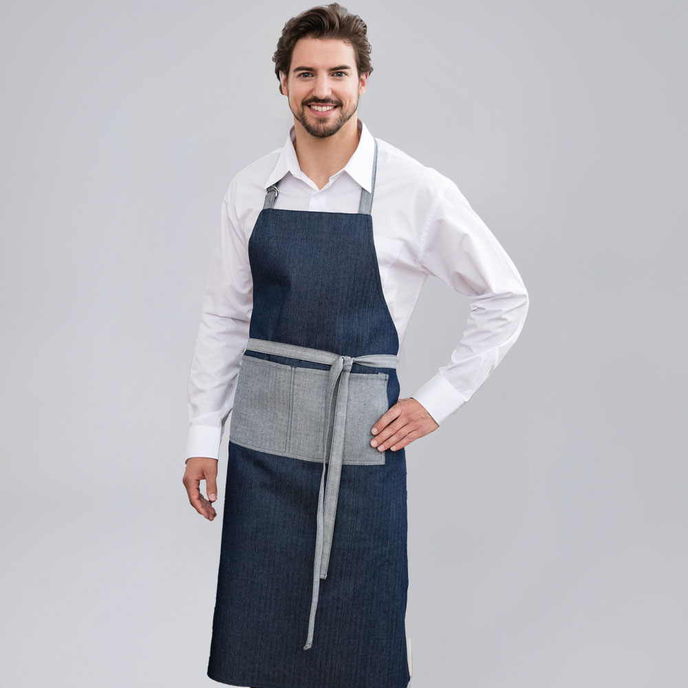 Nackenband verstellbar (mit D-Ring) aufgesetzte Tasche in Kontrastfarbe über ganze Schürzenbreite.