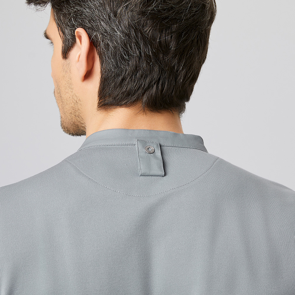 Langarm-Funktions-jacke,Schlaufe für Schürzenbänder,aif dem Rücken.